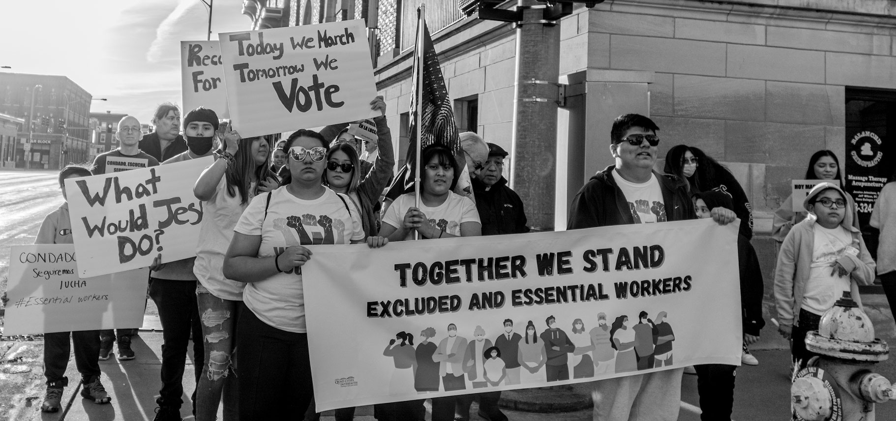 A group of young people with protest signs