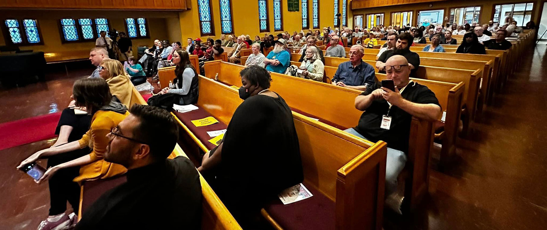 A group gathers in a church